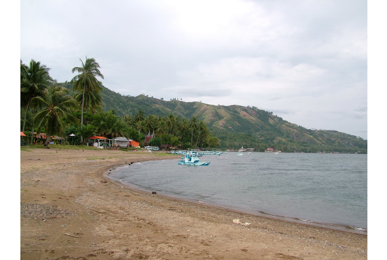 Pesona Keindahan Pantai Mutiara Tanjung